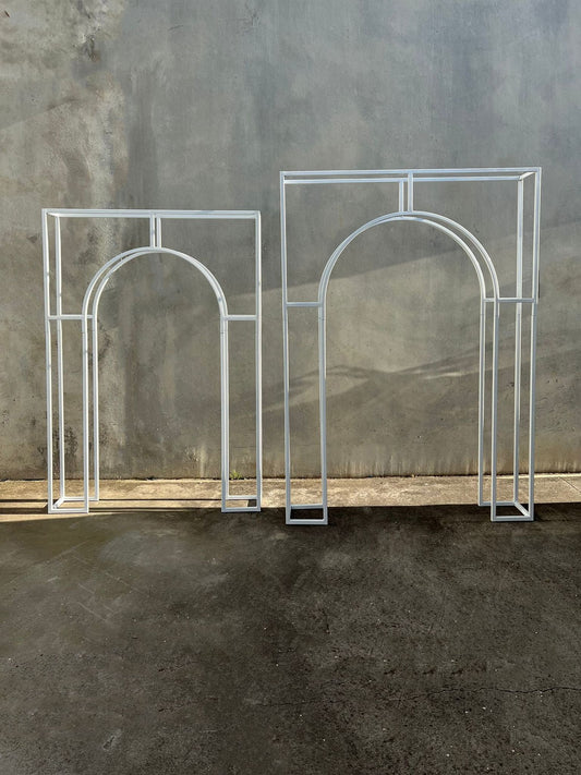 white arched frames
